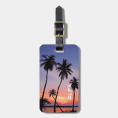 シルエットのパームツリーのある熱帯の夕日 ラゲッジタグ (正面縦)
