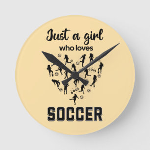 シルエットの女の子がサッカーをしている ラウンド壁時計