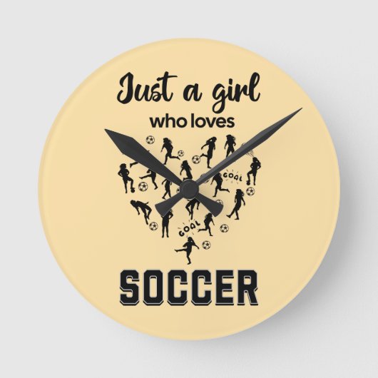 シルエットの女の子がサッカーをしている ラウンド壁時計 (正面)