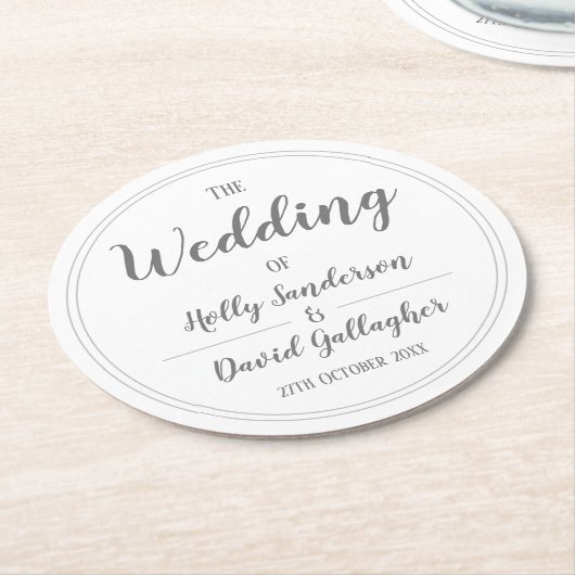 シンプルなシルバーグレーとホワイトのデザイン ラウンドペーパーコースター (アングル)