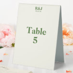 シンプル結婚モダンモノグラム表番号カード テーブルテントサイン<br><div class="desc">希望のモノグラムと特別な日付を含むテーブル番号カードを作成。緑のフォントで黄色の非常に明るい色合い。シンプルアピールモダンしろ。ロマンチック結婚なツリーのデザインコレクションからの供給と完璧。カップルのモノグラム、日付結婚、テーブル番号を追加する。テンプレートを使用して、独自のテーブル番号テーブルテント記号を作成する。</div>