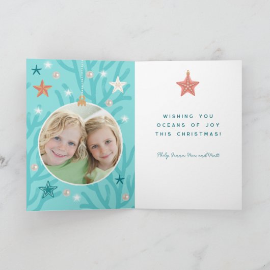 シーズンの挨拶人魚の家族が折り畳まれた シーズンカード (内部)