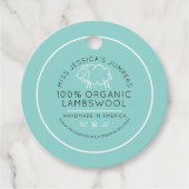 シープウールアクアホワイトブラックニットビジネスクラシック フェイバータグ (正面)