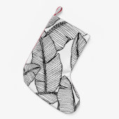 シームレスなバナナの葉のパターン背景。黒と スモールクリスマスストッキング (正面 (吊り時))