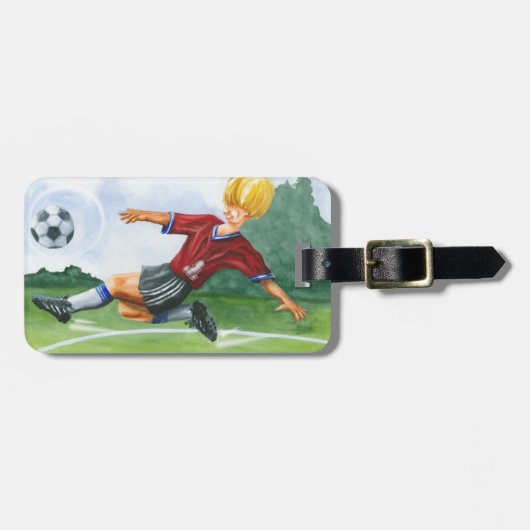 ジェイ・スロックモートンがボールを蹴るサッカー選手 ラゲッジタグ (正面横)