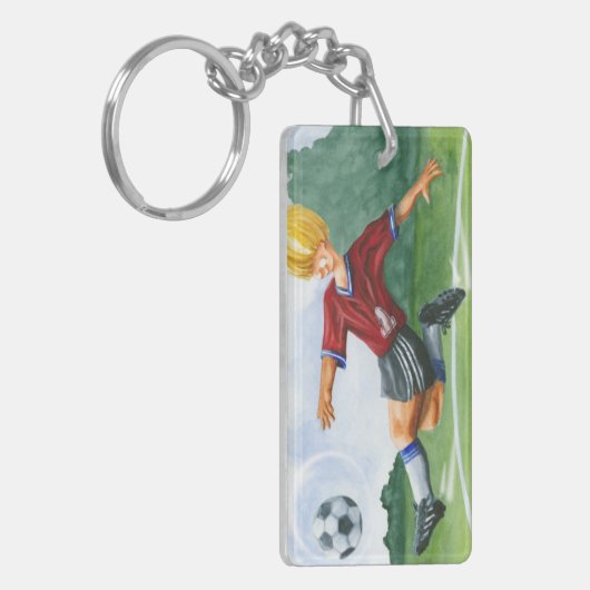ジェイThrockmorton著球を蹴っているサッカーの選手 キーホルダー (正面左)