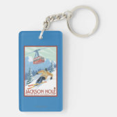 ジャクソンホール、ワイオミングのスキーヤーおよび市街電車 キーホルダー (裏面)