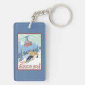 ジャクソンホール、ワイオミングのスキーヤーおよび市街電車 キーホルダー (裏面)