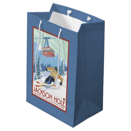 ジャクソンホール、ワイオミングのスキーヤーおよび市街電車 ミディアムペーパーバッグ (裏面アングル)