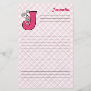 ジャックウサギのMongramピンクの"J"の並べられた文房具 便箋