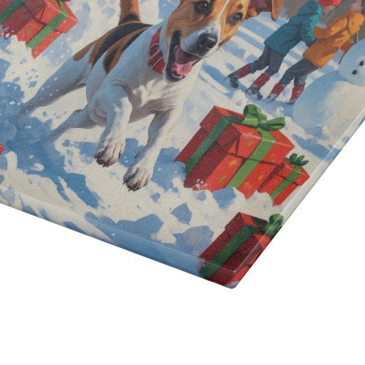 ジャックラッセル走がクリスマス帽子と雪に降りてくる カッティングボード (角)