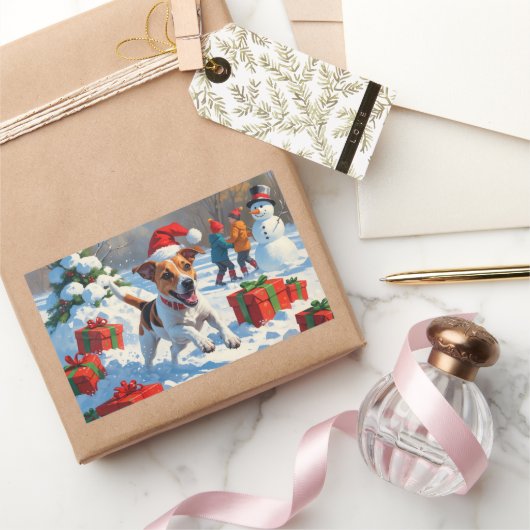 ジャックラッセル走がクリスマス帽子と雪に降りてくる 長方形シール (ギフト)