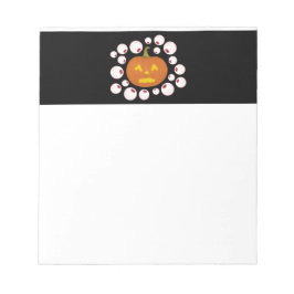 ジャック・オ・ランタンのカボチャと闇の中の眼球 ノートパッド