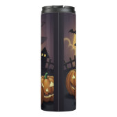 ジャック・オ・ランタンの緑のアイハロウィーンの魔女 タンブラー (裏面)