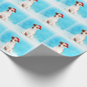 ジャック・ラッセル・ドッグ雪の中でサンタ・ハットと一緒に座る ラッピングペーパー (角)