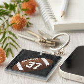 ジャージーの数またはモノグラムのフットボールのキーホルダー キーホルダー (正面右)