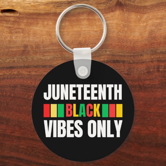 ジュネクファーメラニンメンズウィメンズキッズ キーホルダー (正面)