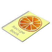 ジューシーなオレンジ色のフルーツポップ・アートのアート ノートブック (左側)