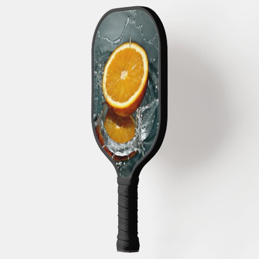 ジューシー前向きなビタミン気分のためのオレンジ ピックルボールラケット (左)