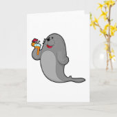 ジュースを飲むアザラシ カード (黄色い花)