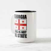 ジョージアこれは米国の州ではない ツートーンマグカップ (正面左)