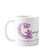 ジョージナの一流の意味装飾的なGモノグラムのマグ