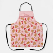 ジンガーブレッドキャンディーケインストッキングピンクのクリスマス エプロン (正面)
