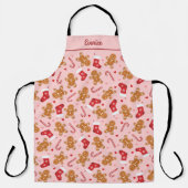 ジンガーブレッドキャンディーケインストッキングピンクのクリスマス エプロン (正面)