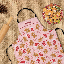 ジンガーブレッドキャンディーケインストッキングピンクのクリスマス エプロン