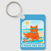 ジンジャーの猫がビーチでくつろぐ 夏と海が恋しい キーホルダー (正面)