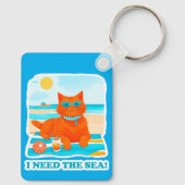 ジンジャーの猫がビーチでくつろぐ 夏と海が恋しい キーホルダー (裏面)