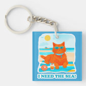 ジンジャーの猫がビーチでくつろぐ 夏と海が恋しい キーホルダー (正面)
