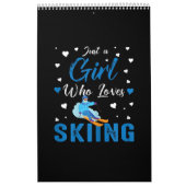 スおもしろいキーでウィンタースポーツの贈り物を愛する少女 カレンダー (カバー)