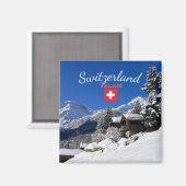 スイスのログキャビンに雪が降り積もる マグネット (正面/裏面)