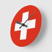 スイス国旗の時計 ラウンド壁時計 (傾斜)