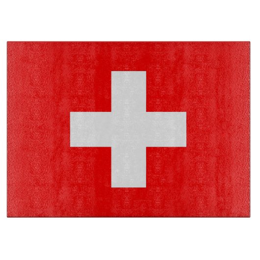 スイス国旗を掲げたガラス板 カッティングボード (正面)