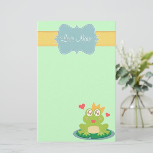 スイレンの浮いている葉のきらめくな目を持つかわいいのカエル 便箋 (スタンド正面)