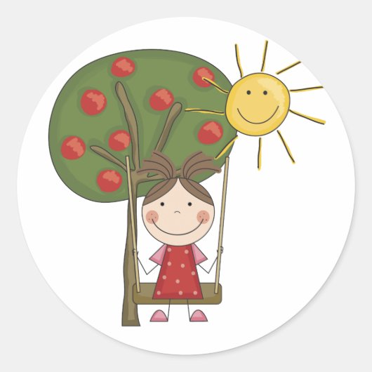 スウィングTシャツとギフトを着た少女 ラウンドシール (正面)