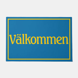 スウェーデンの旗の色で書かれたVälkommen Welcome ドアマット