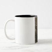 スカルを持つ男性の体(アルバート・エーデルフェルト著) ツートーンマグカップ (左)