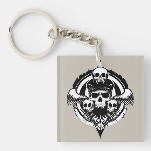 スカルデザインは翼とシンボルを特徴とする キーホルダー (正面)