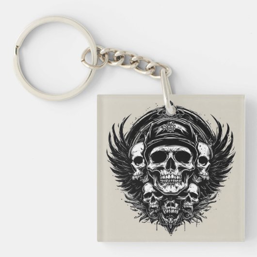 スカルデザインは翼とシンボルを特徴とする キーホルダー (正面)