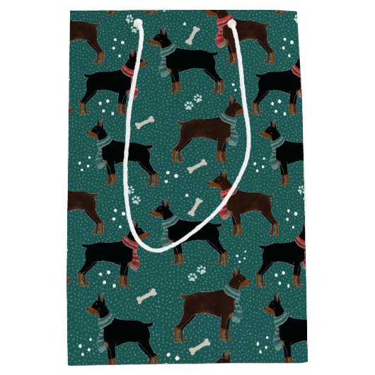 スカーフの冬のパターンの赤と黒のドーバーマン ミディアムペーパーバッグ (正面)