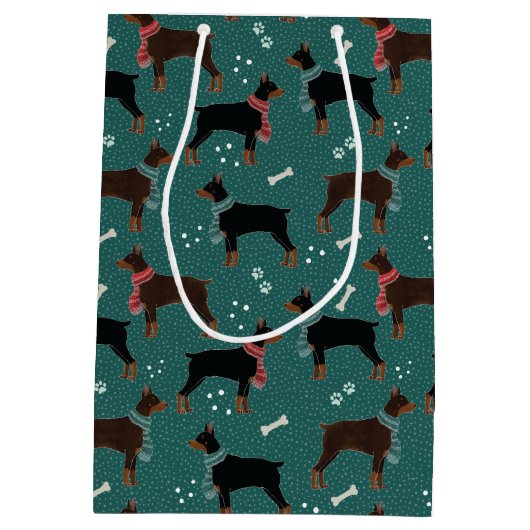 スカーフの冬のパターンの赤と黒のドーバーマン ミディアムペーパーバッグ (裏面)