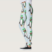 スカーフを着たペンギンの漫画の文字パターン レギンス (左)