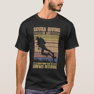 スキューバダイビングは人生だ他の全てが表面にある Tシャツ