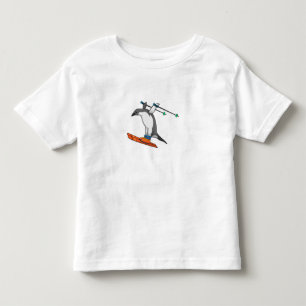 スキーとスキージャンパーのペンギン トドラーTシャツ