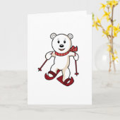 スキーとスキーポールを持つスキーヤーとしてベア カード (黄色い花)