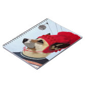 スキーのセーターを着た犬 ノートブック (左側)