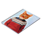 スキーのセーターを着た猫 ノートブック (左側)